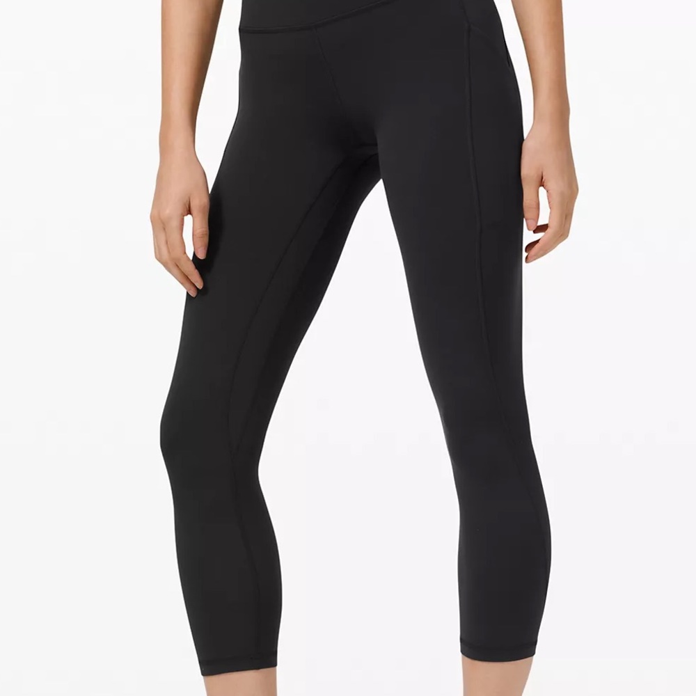 Lululemon black 23” leggings with pockets size 4